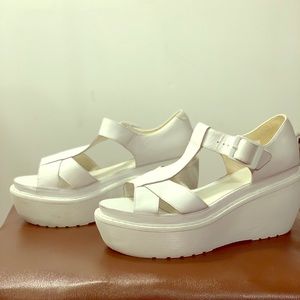All white Dr. Martens sandals